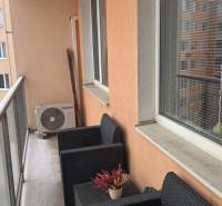 A balcony with rattan furniture at an apartment on Humenská Street, Košice - Západ district.