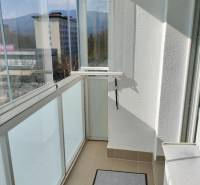 Glazed balcony with a view of the city MartinJilemnického in a 2-room apartment.