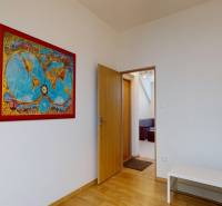 Offices with a map on the wall, doors, and a floor with a wood decor.