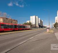 A tram on Saratovská Street. In the background, apartment buildings in Bratislava - Dúbravka.