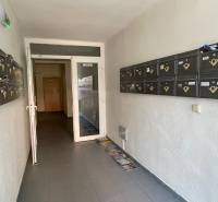 Entrance hallway with mailboxes in an apartment building on Vodárenská Street in Galanta.