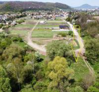 Aerial view of land in Haniska surrounded by greenery and road infrastructure.