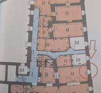 Architectural plan of commercial spaces with room labels and dimensions.