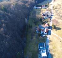 Aerial view of houses and forest in the recreational area of Župkov.