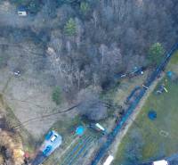 Aerial photograph of recreational plots in Župkov with a meadow and buildings.