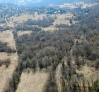 Aerial view of recreational plots in Kľak, surrounded by forests and meadows.