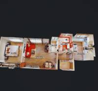 3D floor plan of a 2-room apartment with a room, kitchen, bathroom, and wooden decor flooring.