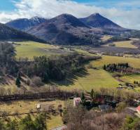 From Tŕstia, you can see family houses with a picturesque mountain landscape.