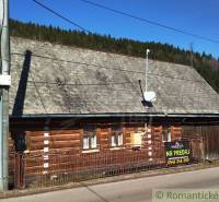 Family house in Osturňa with wooden elements and shingle roof for sale.