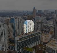Panorama of Bratislava with a view of Plynárenská Street, surrounded by high-rise buildings and a 3-room apartment.