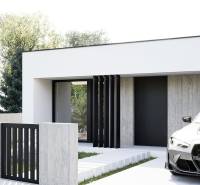 A single-story family house in Nesvady with a BMW on the driveway.
