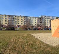 Climbing wall in front of the apartment building on Prachatická Street in Zvolen, 2-room apartment.