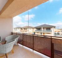 A balcony with a view of Lipova Street in the town of Veľký Biel, part of a 3-room apartment.