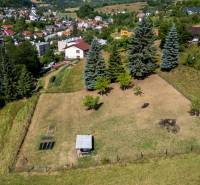 Residential plots in Banská Belá with greenery and views of the surrounding nature.