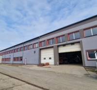 Warehouses and halls on Východná Street in Poprad with a parked truck and a cargo vehicle.