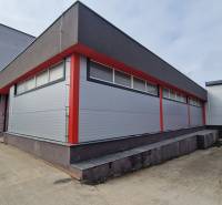 An industrial warehouse on Východná Street in Poprad, equipped with a loading ramp and a modern facade.
