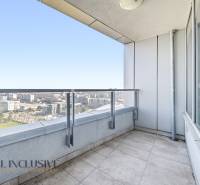 A balcony with a view of the city skyline, 2-room apartment on Bajkalská Street in Bratislava.
