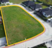 Plots - housing in Kočovce, green area bordered by development.
