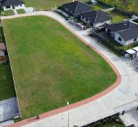 Aerial view of residential plots in Kočovce, surrounded by family houses.
