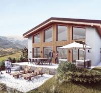 A cottage in Dolná Lehota with a terrace and mountain views, seating area and loungers.