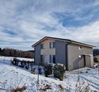 A cottage in Dolná Lehota surrounded by a snowy landscape, set in the nature of Dolná Lehota.