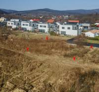 Pezinok, Land - housing: A view of unused land surrounded by houses and nature.