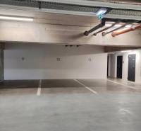 Parking garage with numbered spaces on Bernolákovská Street in Senec.