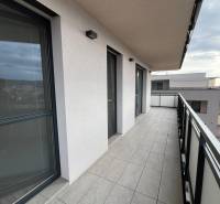 A balcony of a 3-room apartment with tiles and a view in Košice on Alvinczyho Street.