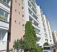 Apartment buildings and cars on Bieloruská Street in Bratislava - Podunajské Biskupice.