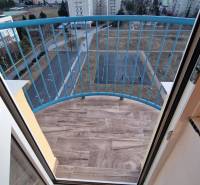 A balcony with a wooden decor floor in a 3-room apartment on Novomeského Street, Poprad.