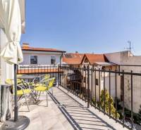Balcony with a view of rooftops and trees, Masarykova Street, Košice - Staré Mesto district, Offices.