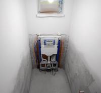 A bathroom under construction in a family house with the installation of a Geberit flushing system.