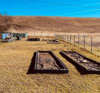 Construction of houses in Prosačov on Prosačov Street, a landlocked environment with a fenced plot.