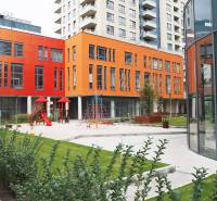 A children's playground with modern apartment buildings on Plynárenská Street in Bratislava - Ružinov.