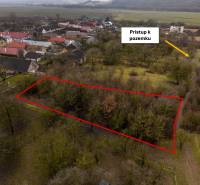 A plot in Gemerské Teplice, surrounded by greenery. Recreational plots with access from the main road.
