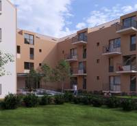 An apartment building in Poprad surrounded by greenery with balconies and passing people.