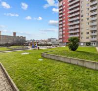 Apartment building with a children's playground in the district of Bratislava - Dúbravka on Nejedlého Street.
