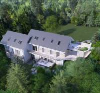 A house in a forest environment with a terrace in the High Tatras.