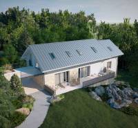 A family house in the High Tatras surrounded by greenery and rocks with a spacious terrace.