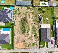 Plots - housing in Štitáre, on Pod Agátmi street, surrounded by family houses.
