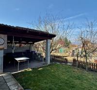 Garden of a family house on Nové Vinohrady Street in Suchá nad Parnou with a garden pavilion.