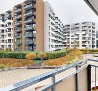 A balcony of a one-room apartment with a view of residential complexes in Bratislava.