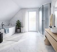Bathroom with a bathtub, shower, and sink in a family house with marble tiles.