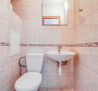 Bathroom with a mirror in a 3-room apartment, tiled.