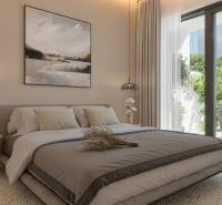 Bedroom in a family house with large windows, wooden decor flooring, and a painting on the wall.