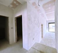 A family house with bare walls and an open layout in Klasov.