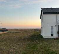 White house at sunset on the grounds - living in Neusiedl am See.