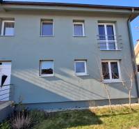 A family house with a front garden on Nitrianska Street in Nitra with a staircase and railing.