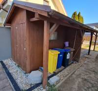 A wooden garden house in the yard of a 3-room apartment on Nitrianska Street in Nitra.