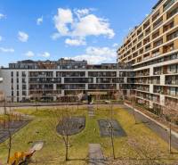 The exterior of the apartment complex on Zuzany Chalupovej in Bratislava - Petržalka with a playground.